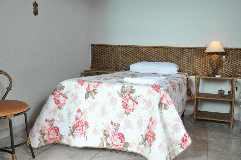 Postel nebo postele na pokoji v ubytování Pousada Beco da Lua