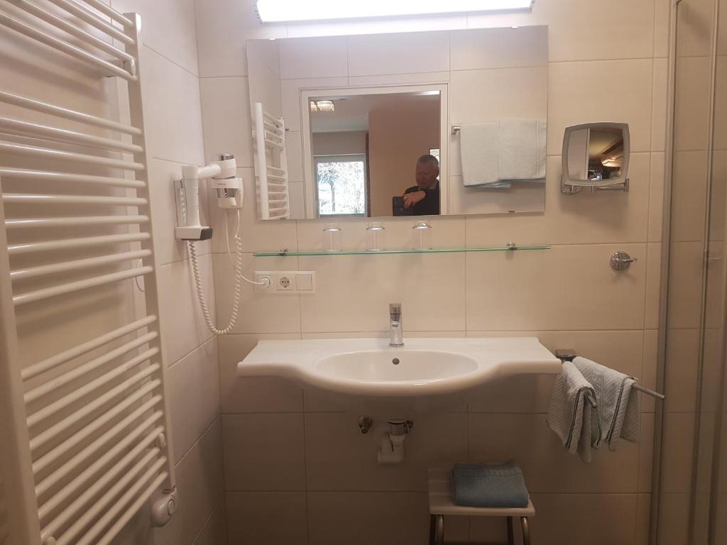 Koupelna v ubytování Comfort Rooms Bruckner
