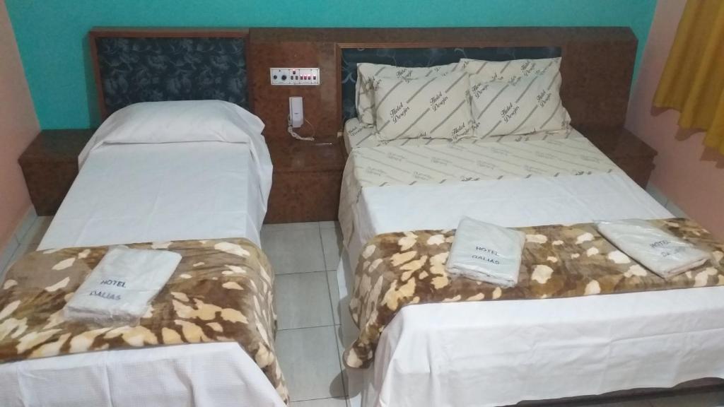 Postel nebo postele na pokoji v ubytování Hotel Dalias