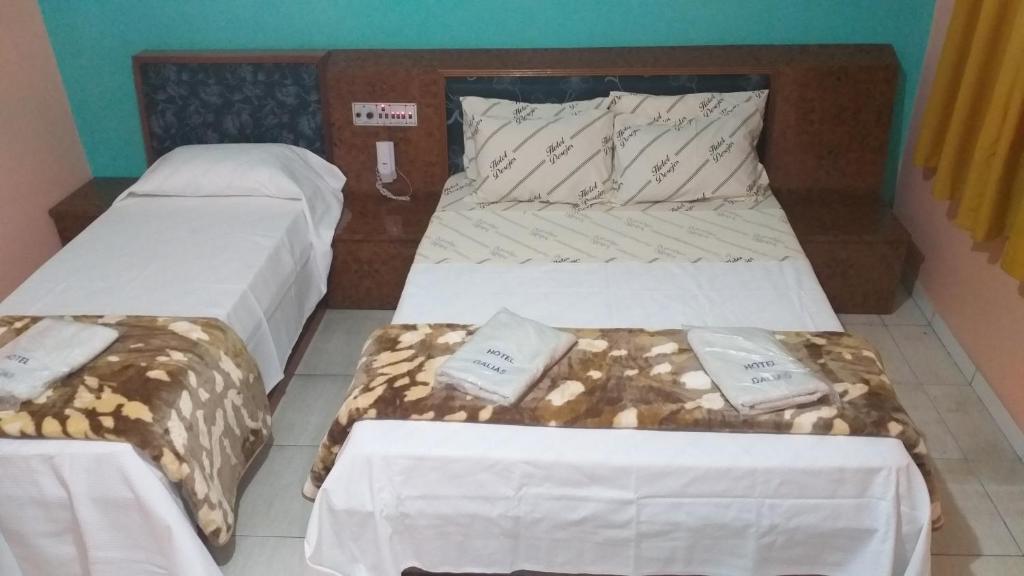 Postel nebo postele na pokoji v ubytování Hotel Dalias