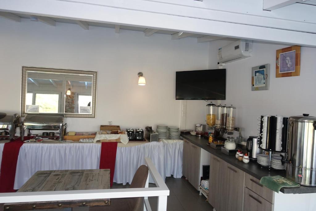 Kuchyň nebo kuchyňský kout v ubytování Hotel Rene