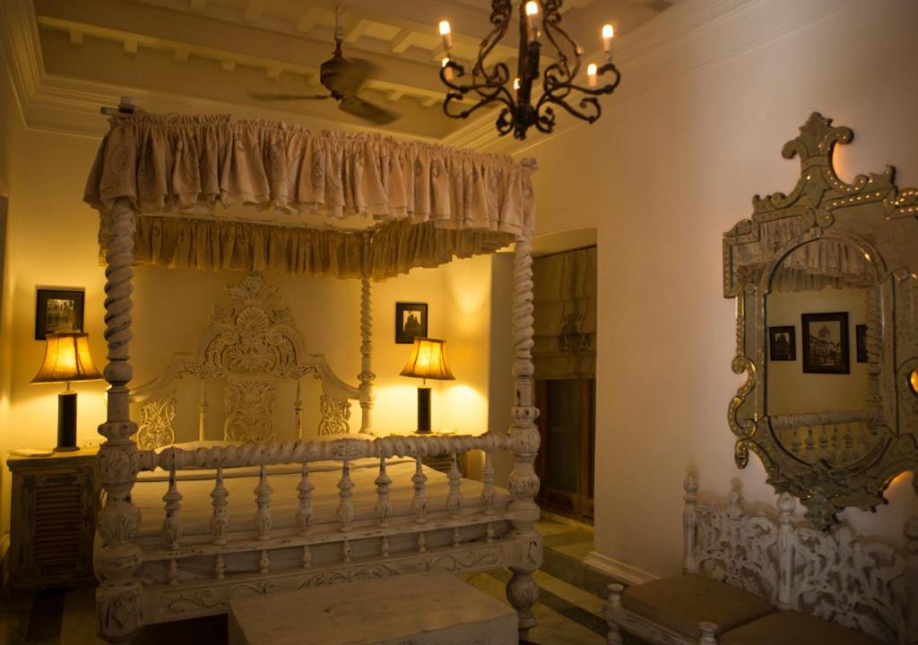 Postel nebo postele na pokoji v ubytování The Rajbari Bawali