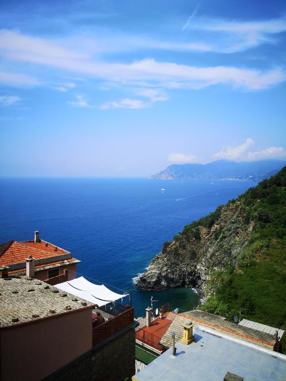 a view of the ocean from a building at Punto Zero Suite in Corniglia