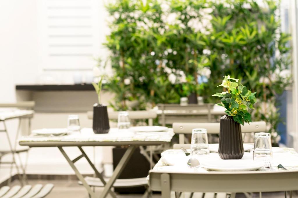 Reštaurácia alebo iné gastronomické zariadenie v ubytovaní Centosedici Rooms