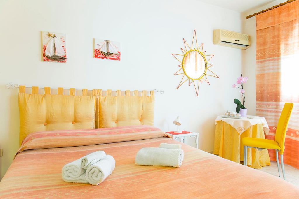 Postel nebo postele na pokoji v ubytování B&b Margherita