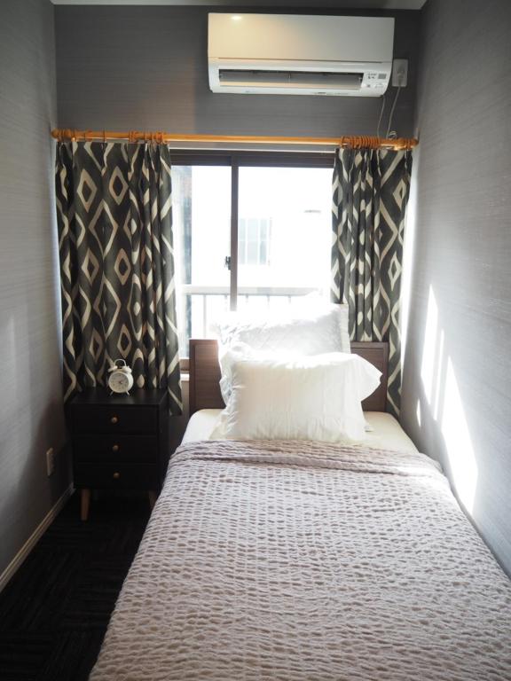 GUEST HOUSE BOSTONSにあるベッド