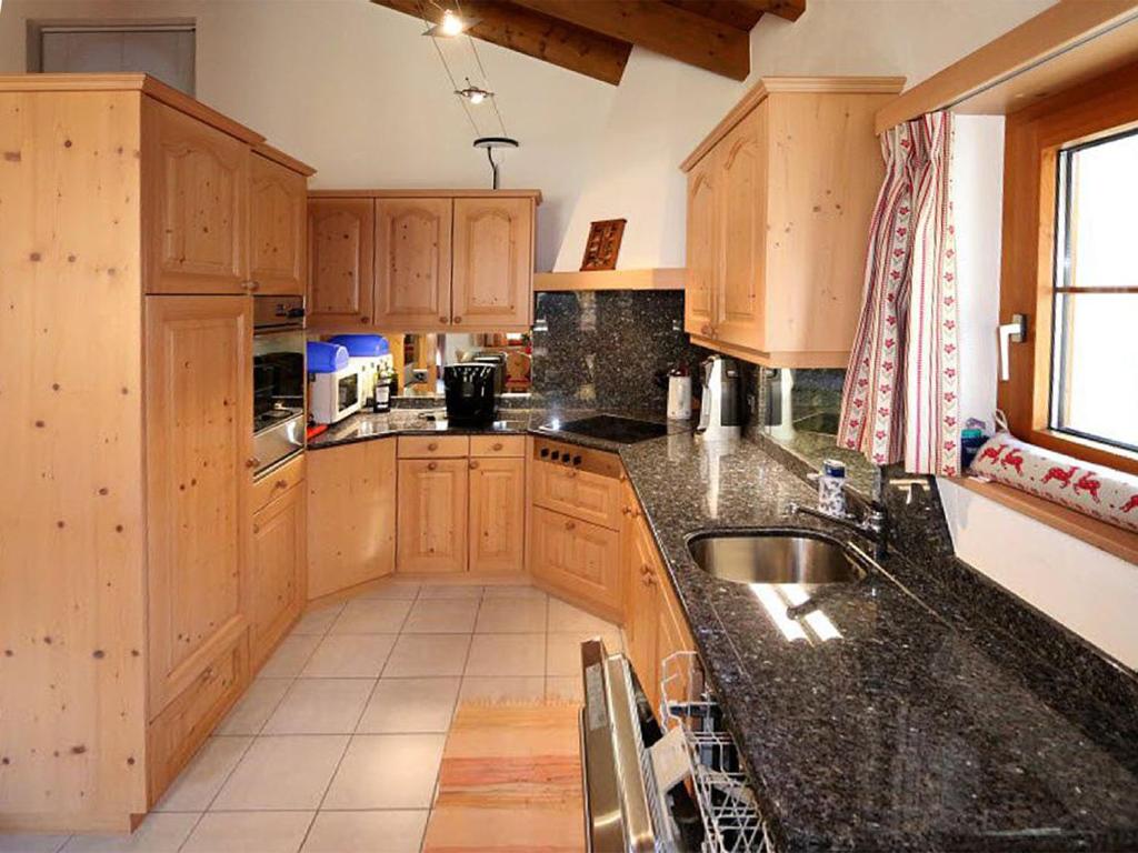 Kuchyň nebo kuchyňský kout v ubytování Chalet Christitia