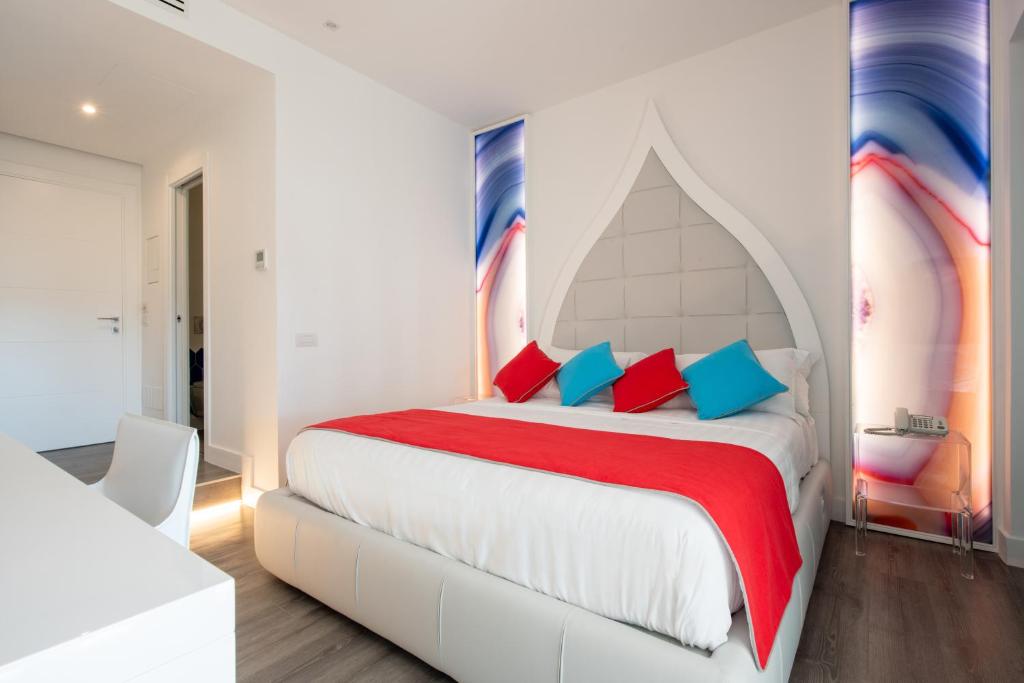 Postel nebo postele na pokoji v ubytování DIAMOND SUITE