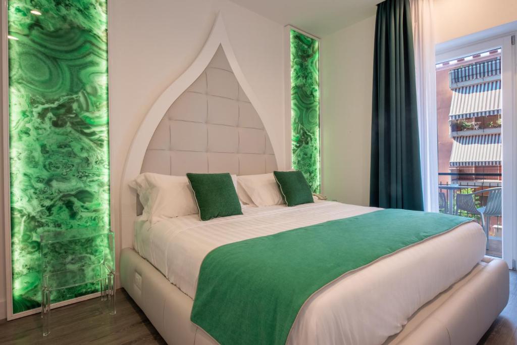 Postel nebo postele na pokoji v ubytování DIAMOND SUITE