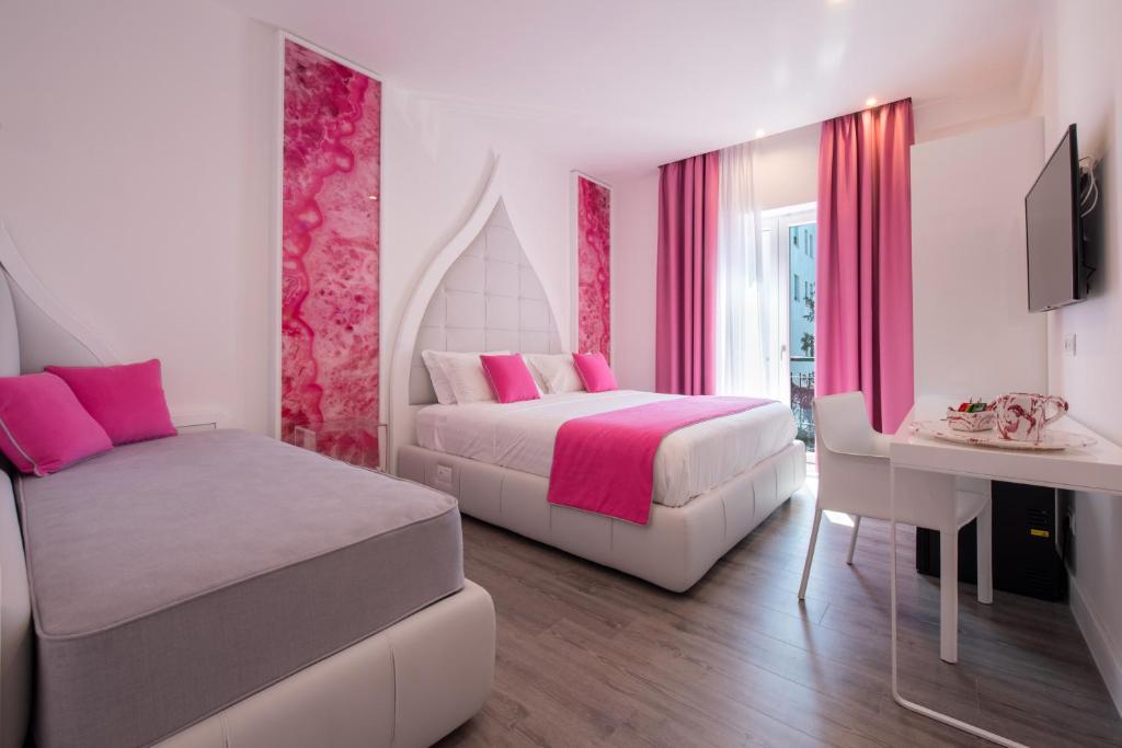 Postel nebo postele na pokoji v ubytování DIAMOND SUITE