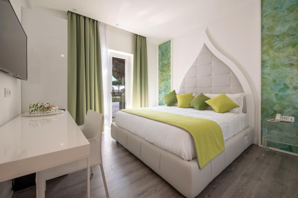 Postel nebo postele na pokoji v ubytování DIAMOND SUITE