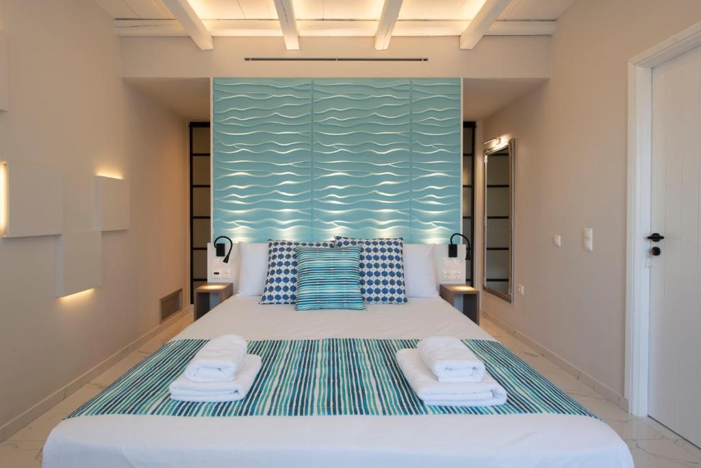 Posteľ alebo postele v izbe v ubytovaní Kotroni Villas