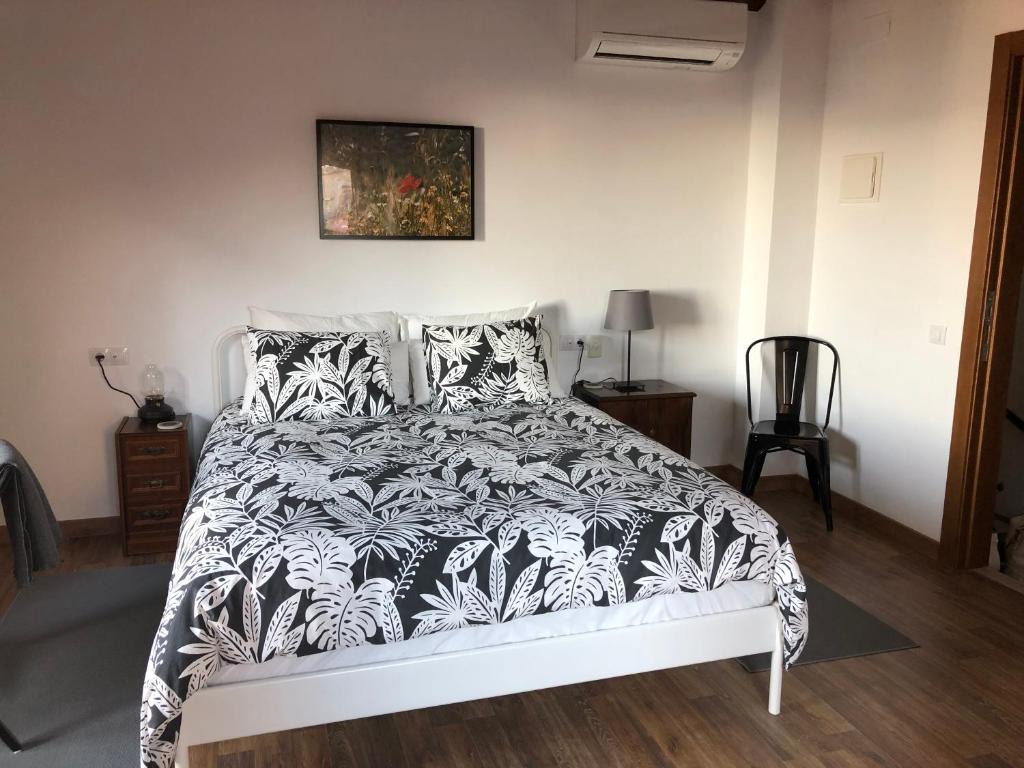 Postel nebo postele na pokoji v ubytování Cal Campana