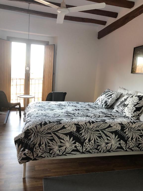 Postel nebo postele na pokoji v ubytování Cal Campana