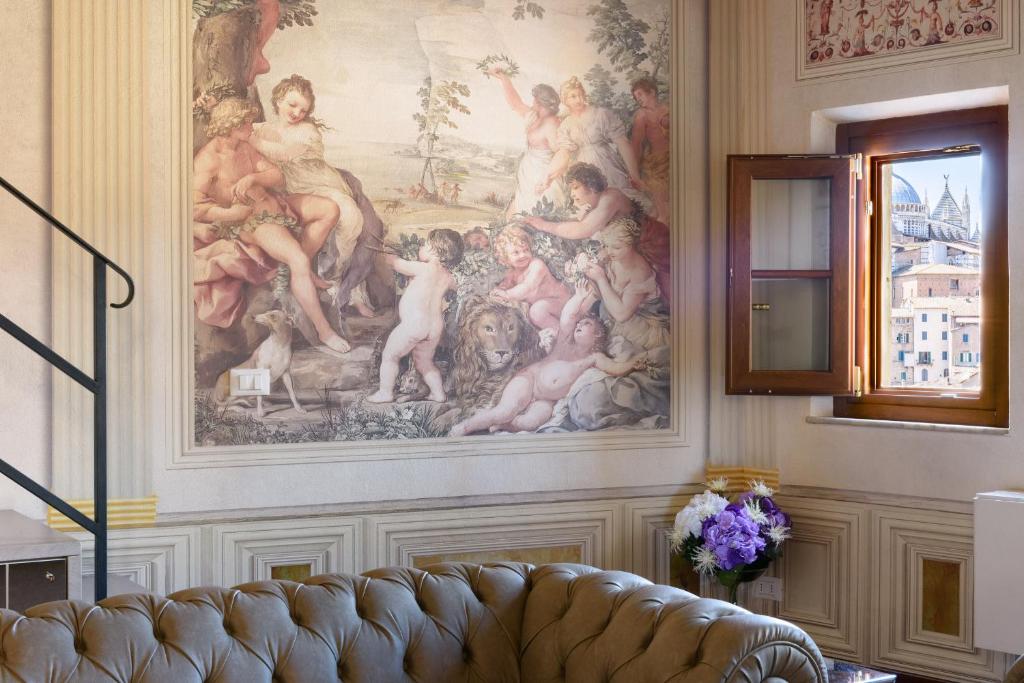 A seating area at Domus Nannini SPA - Palazzo Nannini