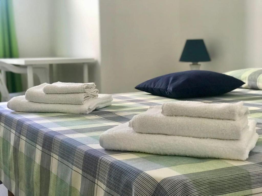 Ένα ή περισσότερα κρεβάτια σε δωμάτιο στο Blu d'Eraclea