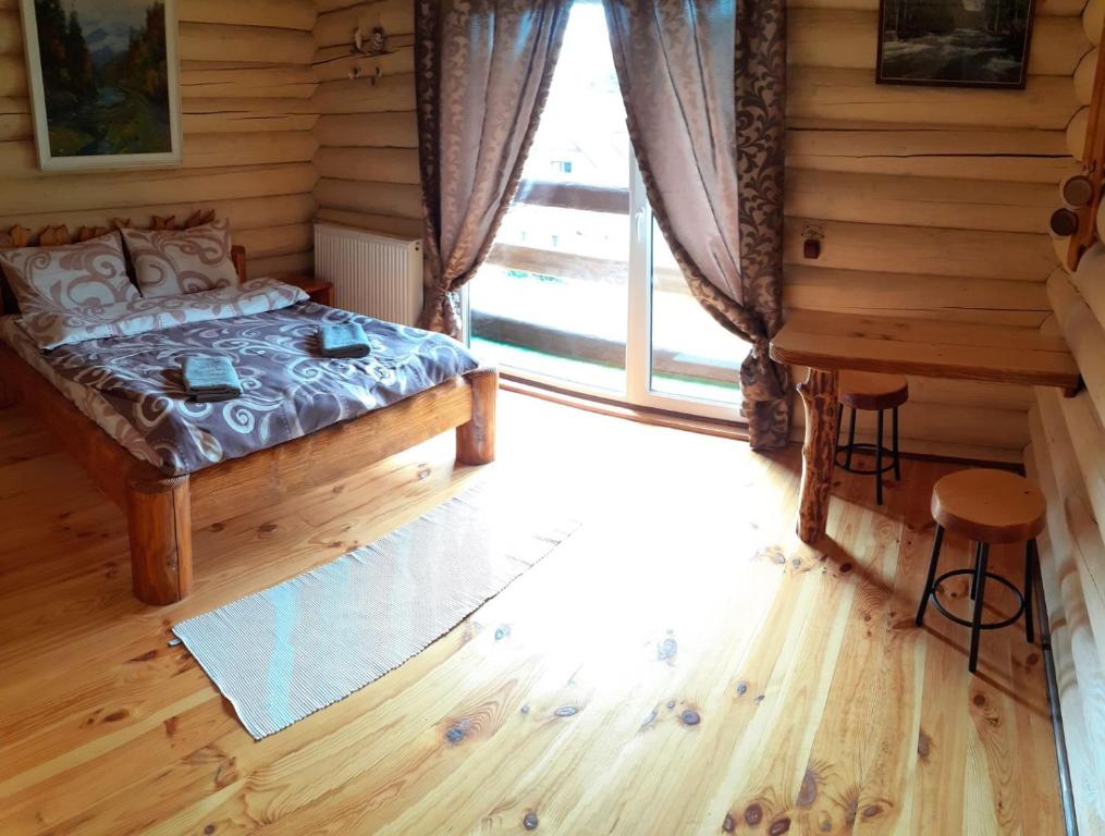 Postel nebo postele na pokoji v ubytování Sadyba Cherry