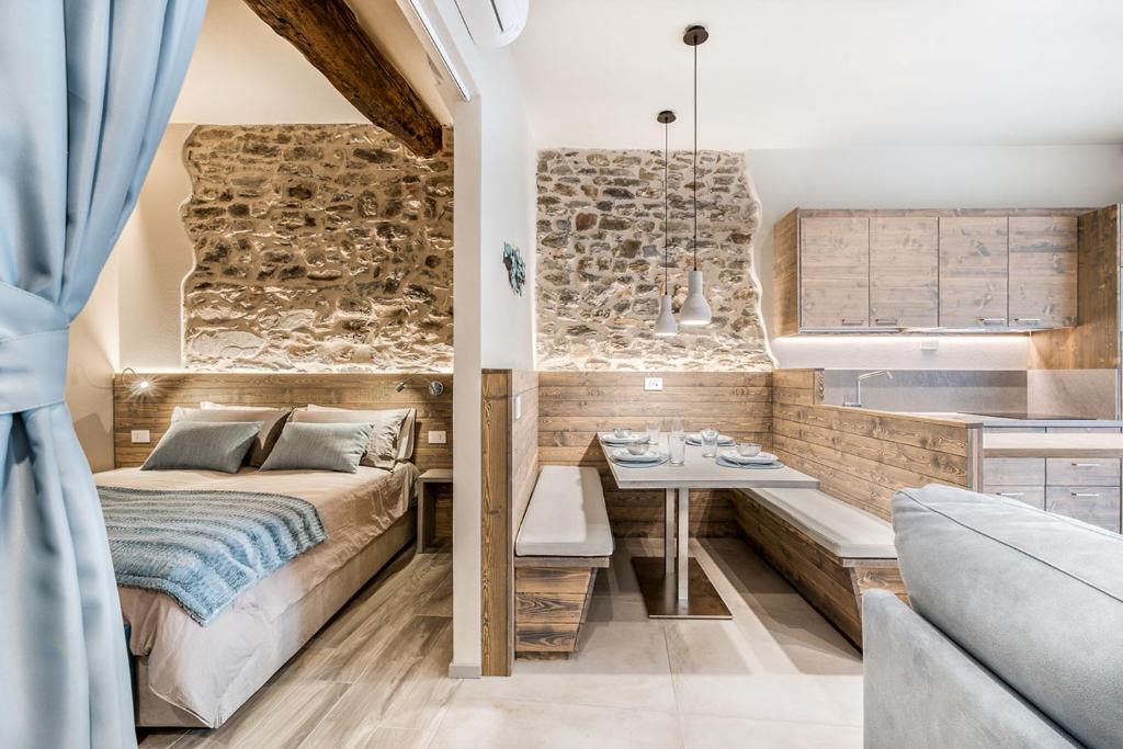 Postel nebo postele na pokoji v ubytování Sergeant First Class Riomaggiore