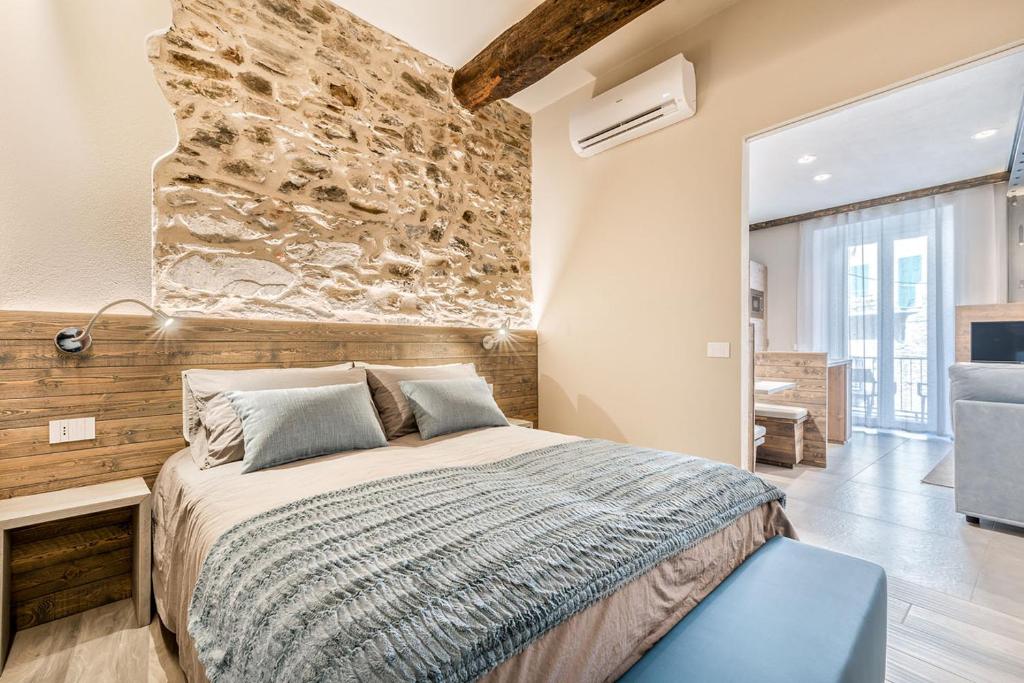 Postel nebo postele na pokoji v ubytování Sergeant First Class Riomaggiore