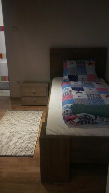 A bed or beds in a room at The Whistling Rabbi