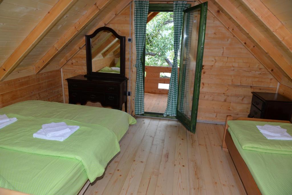 Letto o letti in una camera di Guest house Green Garden