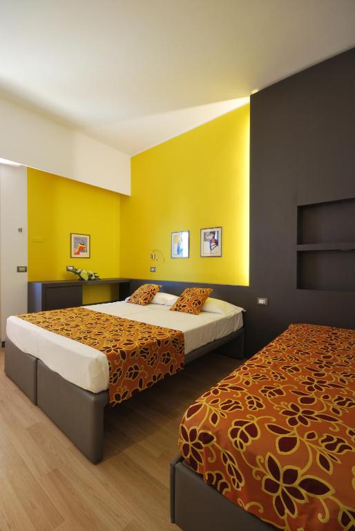 Postel nebo postele na pokoji v ubytování Hotel Imperiale & SPA