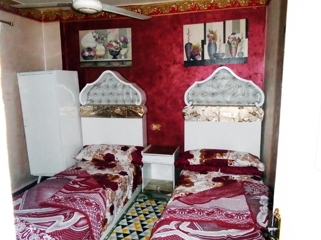 Postel nebo postele na pokoji v ubytování City Hostel