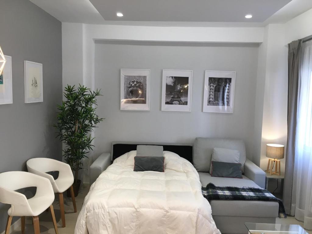 A bed or beds in a room at CARRERA HOME