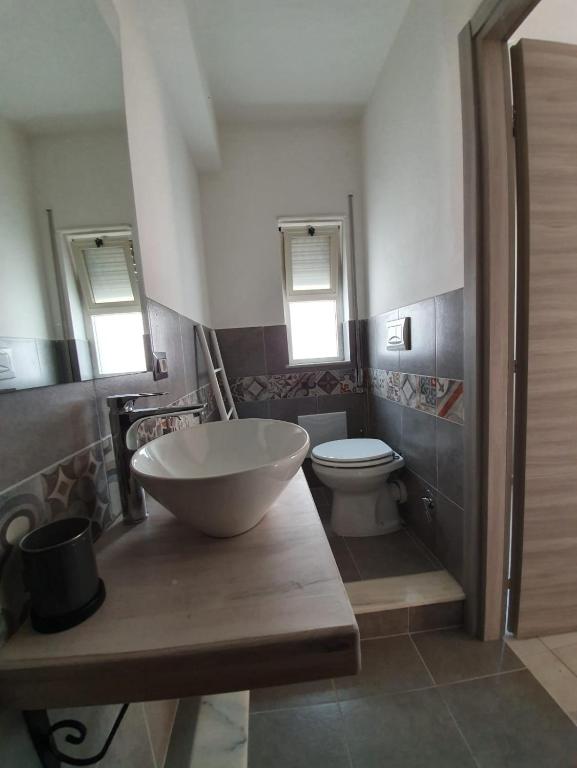 Koupelna v ubytování B&B città del carrubo