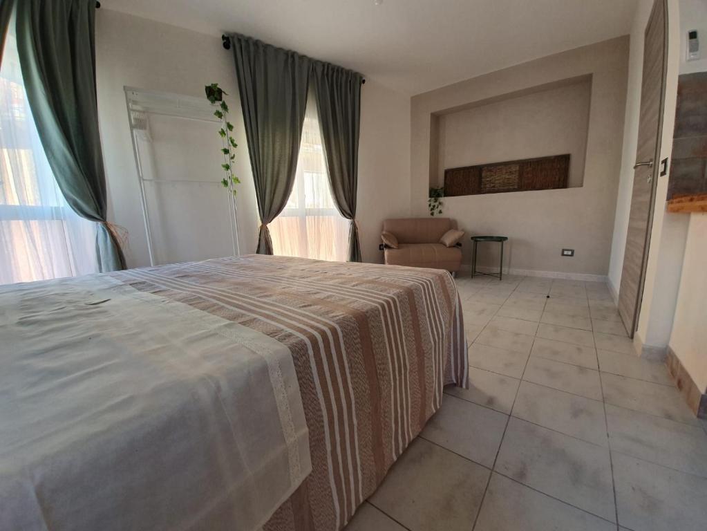 Postel nebo postele na pokoji v ubytování B&B città del carrubo