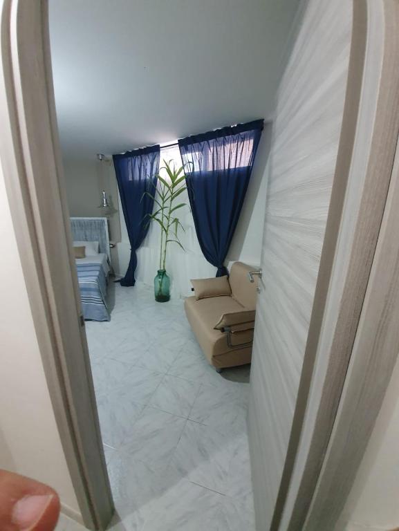 Postel nebo postele na pokoji v ubytování B&B città del carrubo