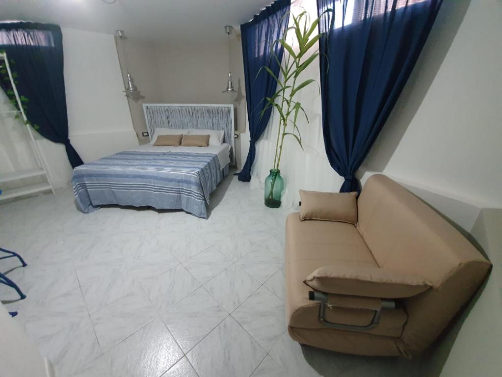 Postel nebo postele na pokoji v ubytování B&B città del carrubo