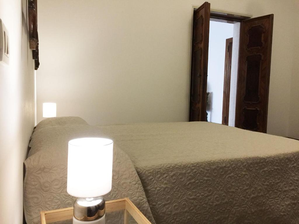 Posteľ alebo postele v izbe v ubytovaní Uma Apartments