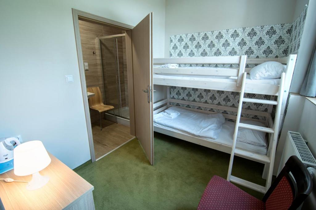 Posteľ alebo postele v izbe v ubytovaní 4family *RESORT*SPA*