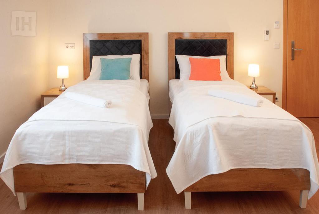 Postel nebo postele na pokoji v ubytování Hotel Isha