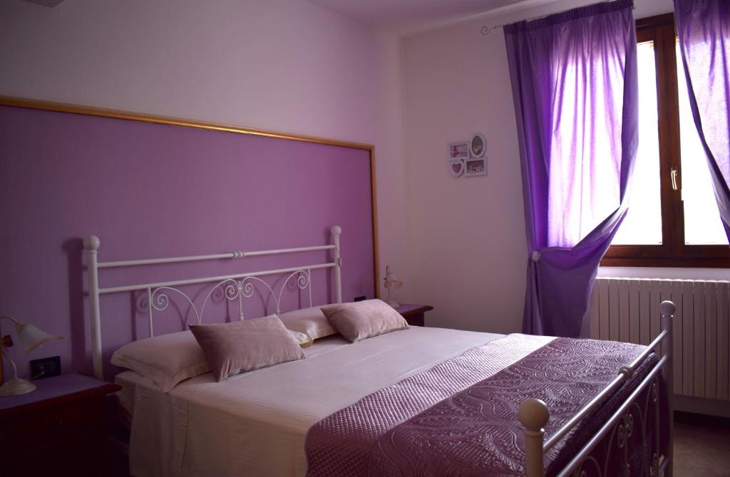 Postel nebo postele na pokoji v ubytování A Casa di Laura