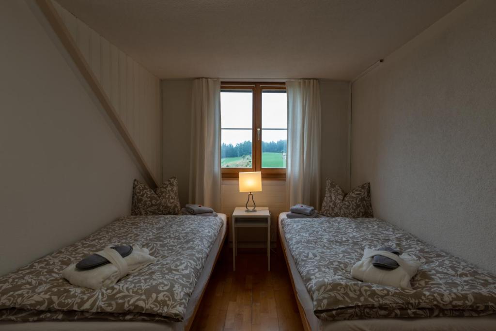 Postel nebo postele na pokoji v ubytování Landgasthof Farnsburg