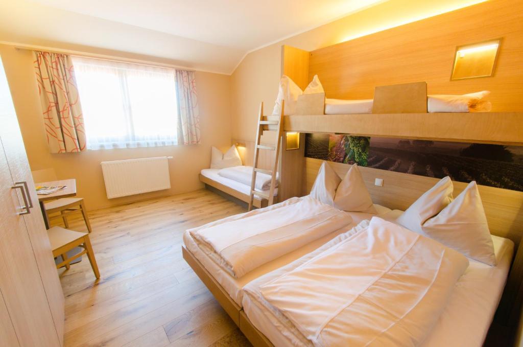 Postel nebo postele na pokoji v ubytování JUFA Hotel Donnersbachwald