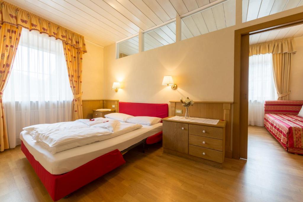 Postel nebo postele na pokoji v ubytování Hotel Weisses Lamm