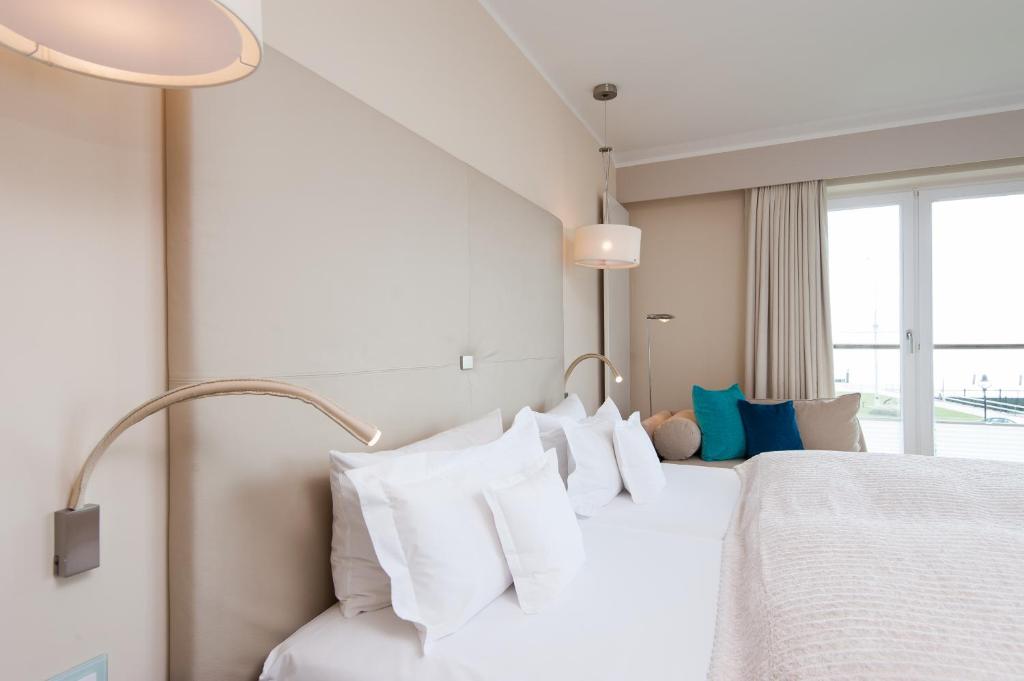 Postel nebo postele na pokoji v ubytování Hotel Fährhaus