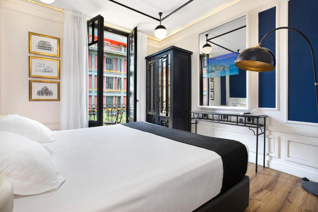 A bed or beds in a room at Hotel Market