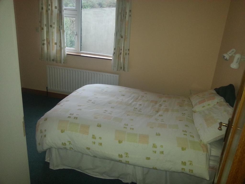 Postel nebo postele na pokoji v ubytování Aran View - Radharc Arainn B&B