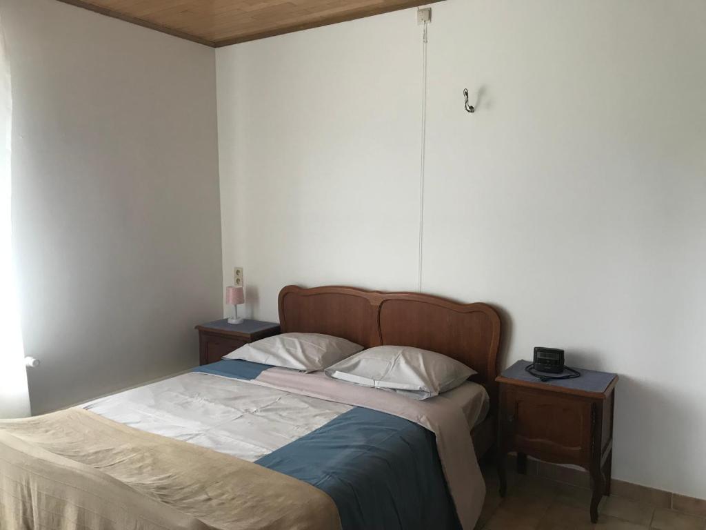 Postel nebo postele na pokoji v ubytování Valkenhof