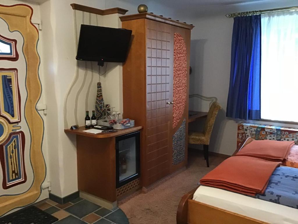 TV a/nebo společenská místnost v ubytování Pension Haus Sanz