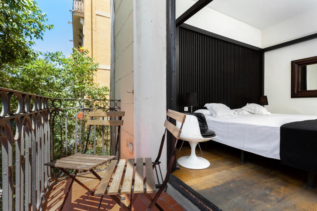 A bed or beds in a room at Hotel Market