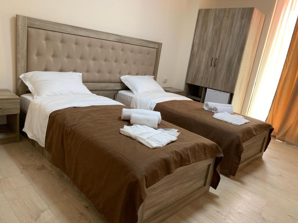 Postel nebo postele na pokoji v ubytování Gala Boutique Hotel
