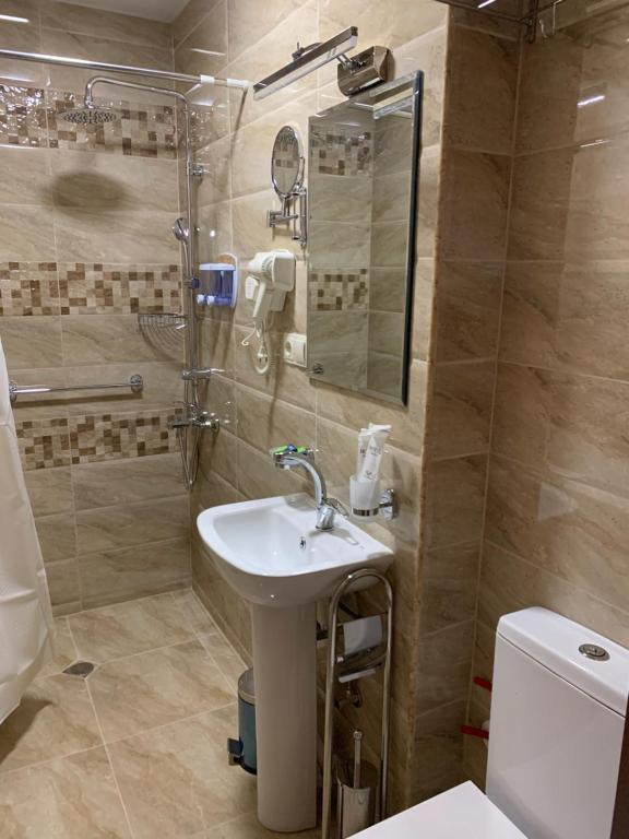 Koupelna v ubytování Gala Boutique Hotel