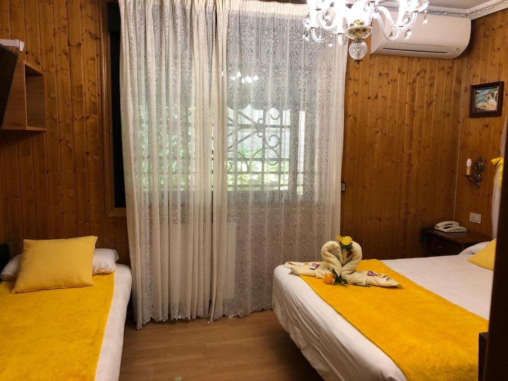 Postel nebo postele na pokoji v ubytování Hotel Playa Samil Vigo