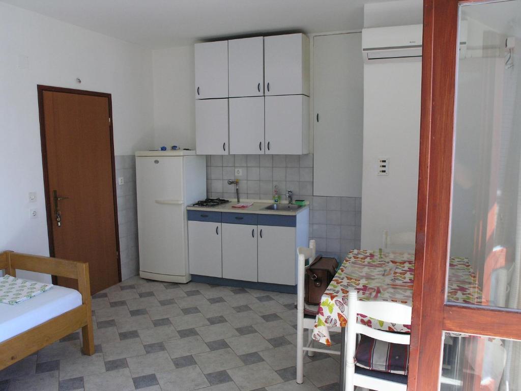 Kuchnia lub aneks kuchenny w obiekcie vala apartmani