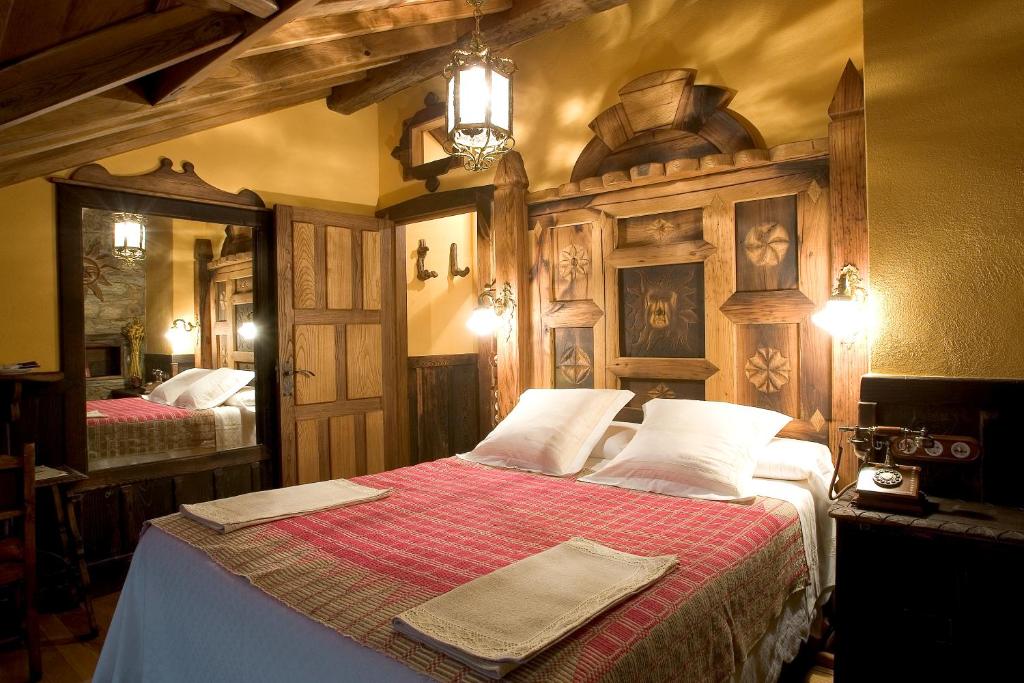Posteľ alebo postele v izbe v ubytovaní Prada a Tope - Palacio de Canedo